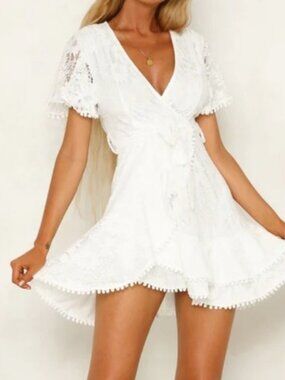 saints + secrets Lace Wrap Mini Dress in Ivory